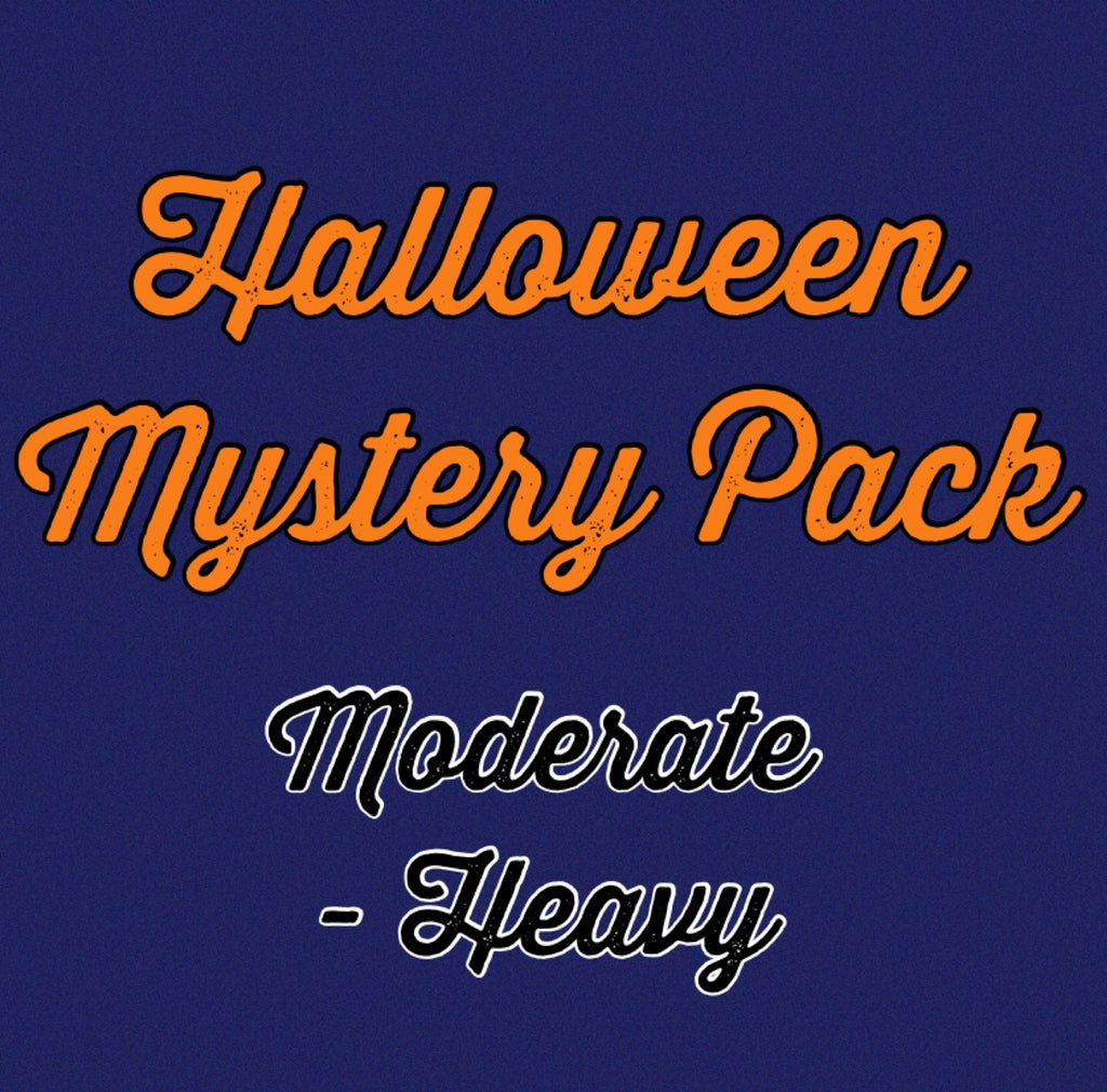An advertisement for Scarlet Eve Halloween Mystery Packs, featuring text over a dark purple background. The text says 'Halloween Mystery Pack. Moderate - Heavy'.