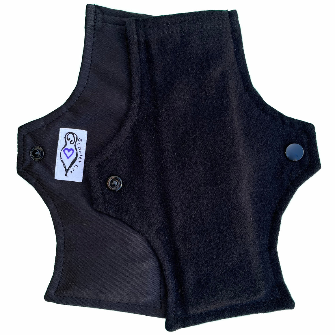 Scarlet Eve Basics New Woman Pad. Top: Soft, black cotton flannel. Back: Solid Black PUL. 3 layer flip out bamboo fleece booster. New Woman Pads are designed with the young teen in mind.