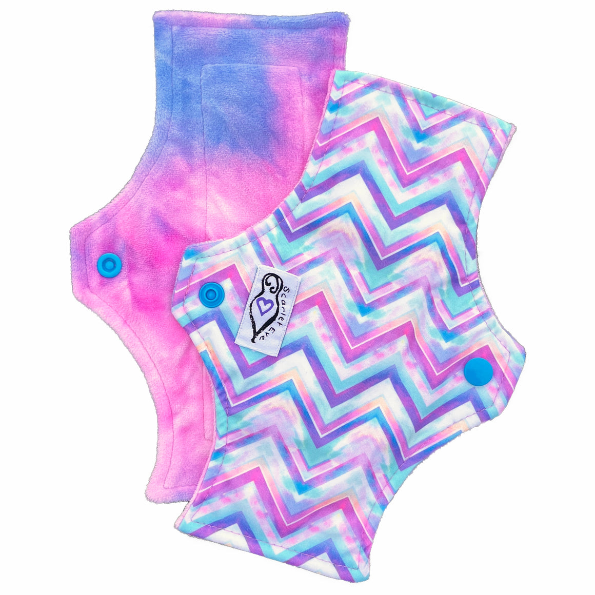 Scarlet Eve Pastel Chevron Mini Pad. Top: Plush Pink and Purple Minky. Bottom: Pastel Chevron PUL. 2 layer bamboo fleece booster sewn in. The original light-weight cloth pad from Scarlet Eve.