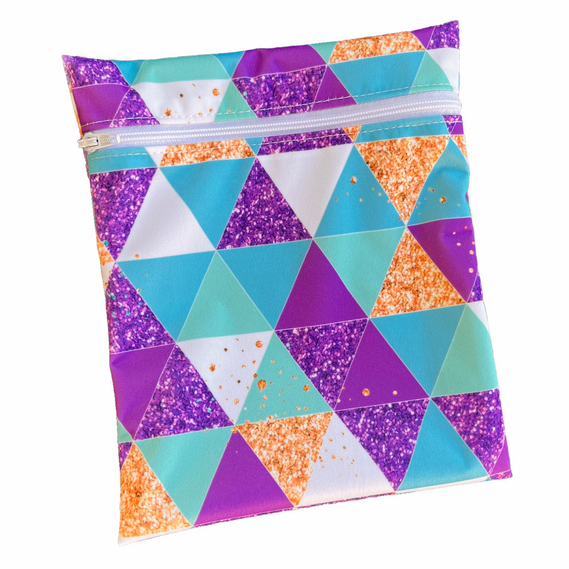 A rectangular zippered pouch against a white background. The wet bag is made from cream PUL fabric with leaves and acorns. A cream coloured zip runs along the pouch towards the top.