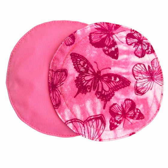 Two reusable nursing pads against a white background. The breast pad on top is made from light pink and white tie dye cotton flannel with maroon butterflies. The breast pad on the bottom is made from raspberry pink PUL fabric.
